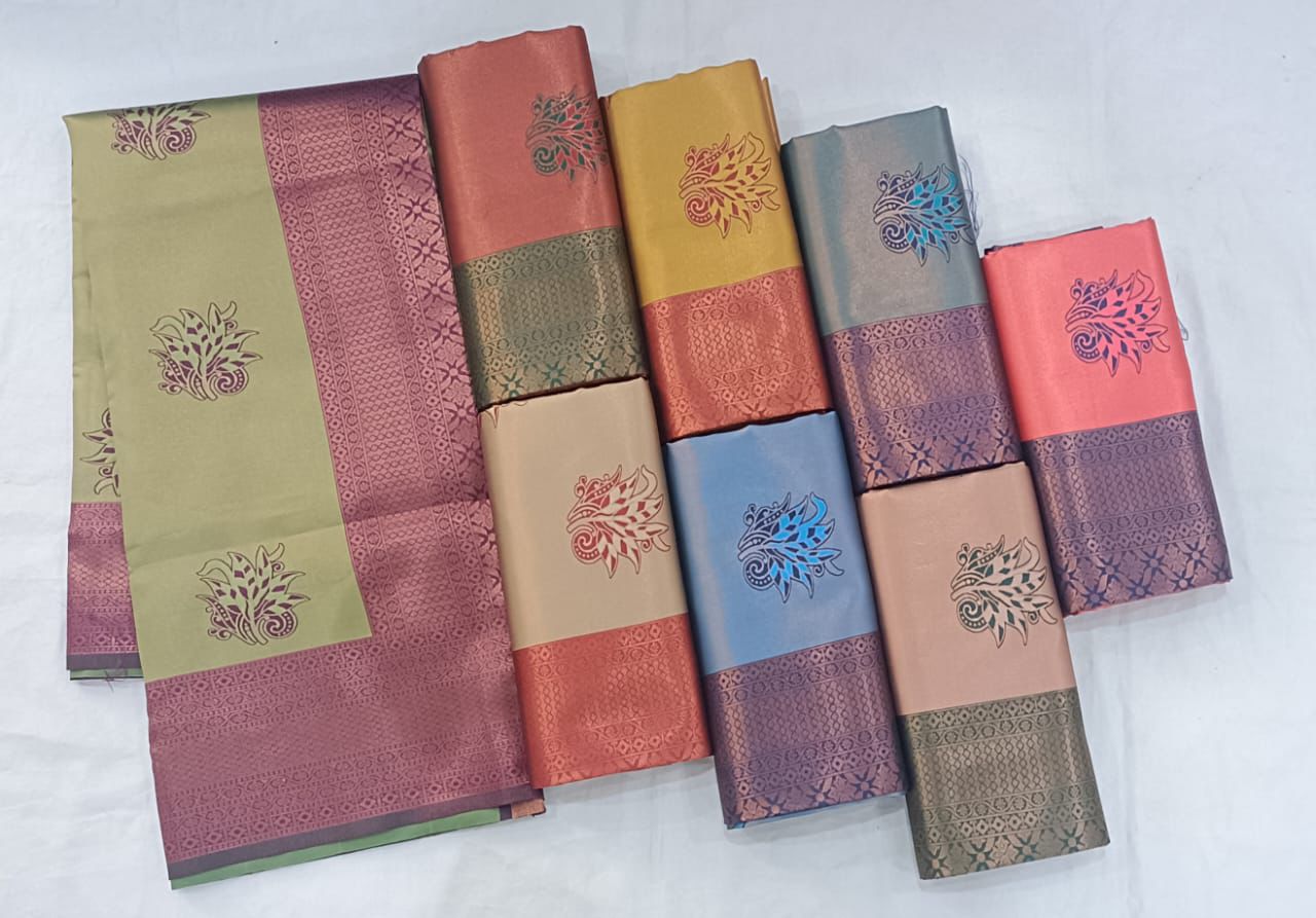 "Traditional Indian Sarees: A Showcase of Vibrant Hues and Intricate Designs"
